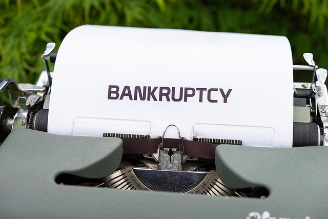 typewriter with bankruptcy written in black letters