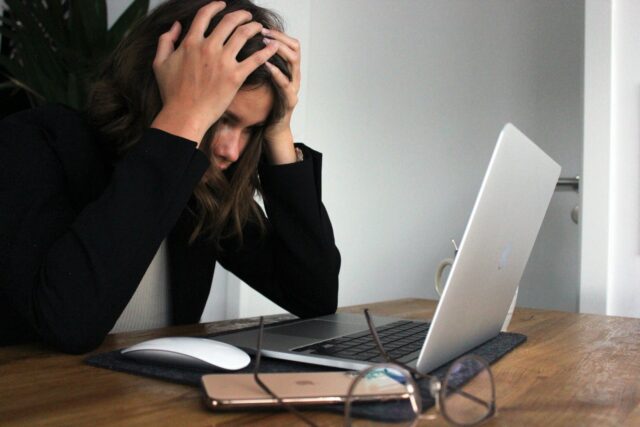 stressed woman at computer